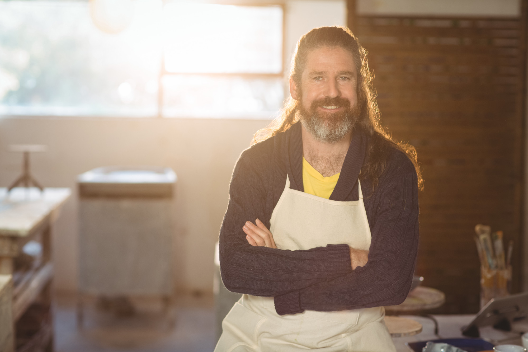 Instructor smiling in a rural kitchen workshop